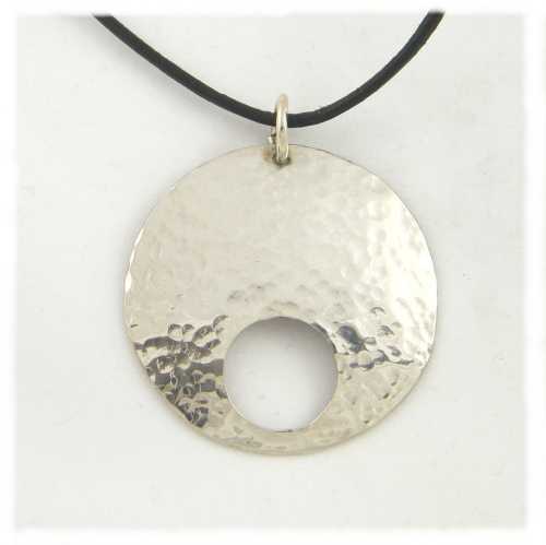 SIlver dimpled circle circle